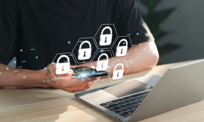 Businessman protects personal information Encryption with padlock icon. .Cyber ​​security...