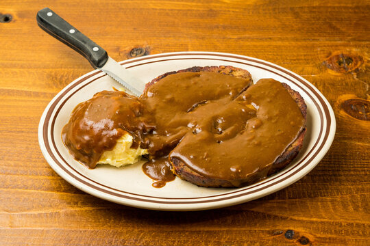 Meatloaf And Mashed Potatoes With Gravy.