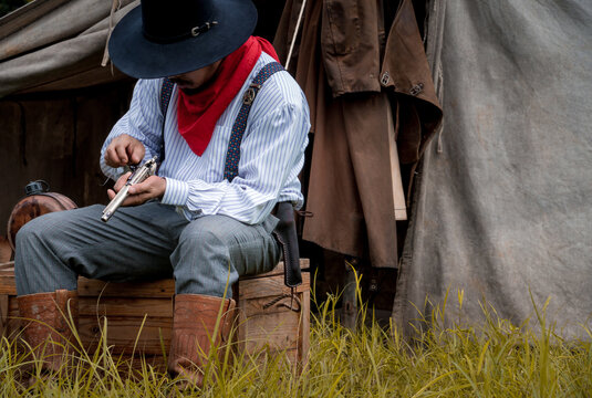 cowboy with gun.portrait cowboy cowboy with gun prepares to gun fight.