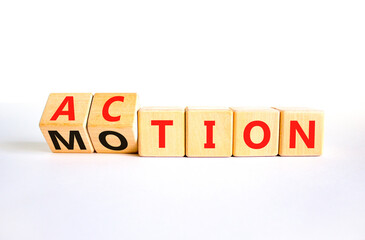 Action or motion symbol. Concept word Motion and Action on wooden cubes. Beautiful white table white background. Business and action or motion concept. Copy space.