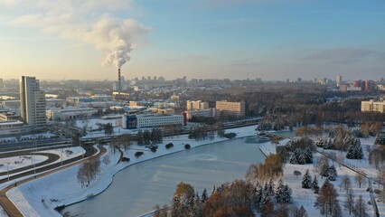 Obraz premium Panoramic view of the eastern outskirts of Minsk, the capital of Belarus. Minsk in the snow in winter. Eastern Europe in winter. Architecture of Minsk.