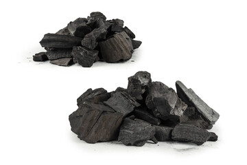 Obraz premium Black oak coal isolated on white background.