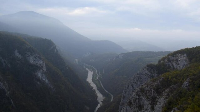 Aerial view of river Vrbas and road near Banja Luka in morning haze from Manjaca mountain