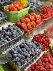 Berries on the market, blueberries and strawberries 