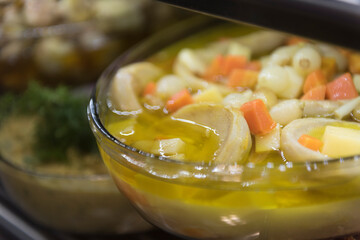 Artichoke appetizer with carrot and olive oil