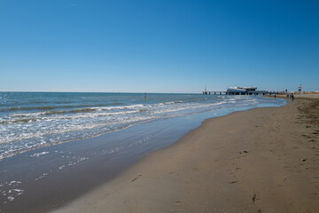 Fototapeta na wymiar Sandy beach without bathers