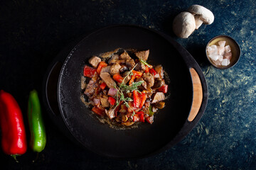 Traditional meat dish with mushrooms and peppers, Orman Kebabı