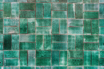 Green ceramic tile background. Old vintage ceramic tiles in green to decorate the kitchen or...