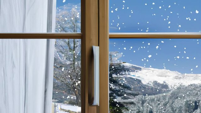view through a window to beautiful landscape in the snow with snowfall
