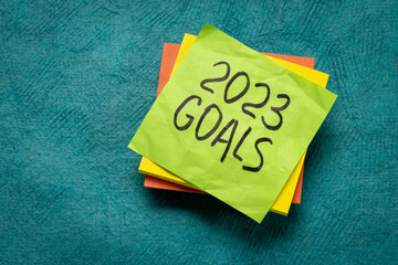 2023 goals  - handwriting in black ink on a reminder note, New Year goals and resolutions concept