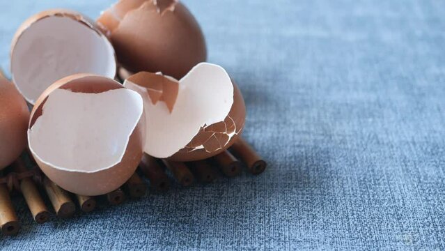 eggshells in a white color bowl on table 