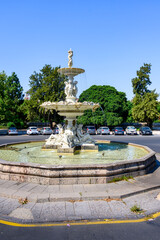 Colonial fountain decorating a roundabout in Valencia, Spain