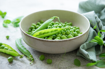 Bowl with sweet pea pods