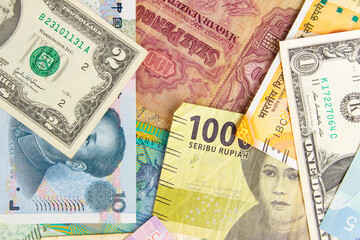 Fototapeta na wymiar Background from different money banknotes from all over the world