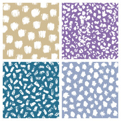 Set of abstract hand drawn seamless patterns, brush strokes textures