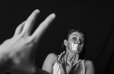Depression woman. Strees. Dark background. Woman dark. Shadow. Black and white photo. 