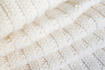 White knitted texture of woolen wool	