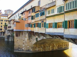 Fototapeta na wymiar Close-up on bridge and river on the sunny day. Florence. Italy.