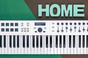 Music keys on a colored background, flat lay.