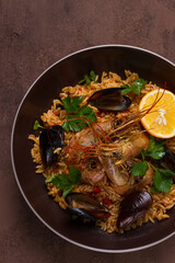 Seafood paella, shrimp and mussels risotto, rice, homemade, top view, no people,