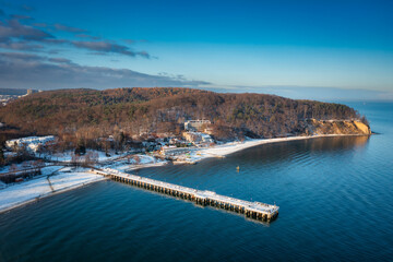 Beautiful landscape with wooden pier in Gdynia Orlowo in winter scenery, Poland