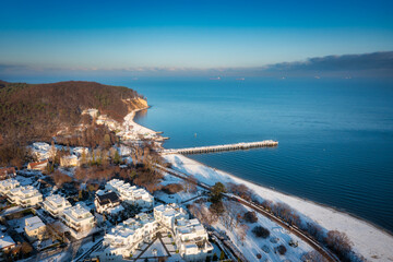 Beautiful landscape with wooden pier in Gdynia Orlowo in winter scenery, Poland