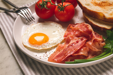 Breakfast, fried egg, bacon and bread, with cherry, on a light background, homemade, no people,