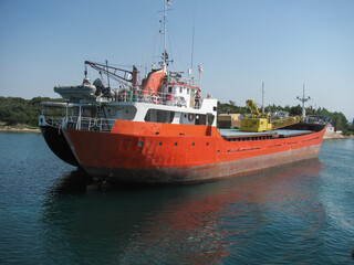 a container ship without cargo bound for port. cargo ship
