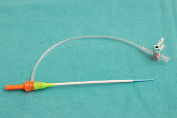 Introducer Transradial Kit, Introducer Sheath. Cannula sheath for arterial line insertion along with a puncture needle. - obrazy, fototapety, plakaty