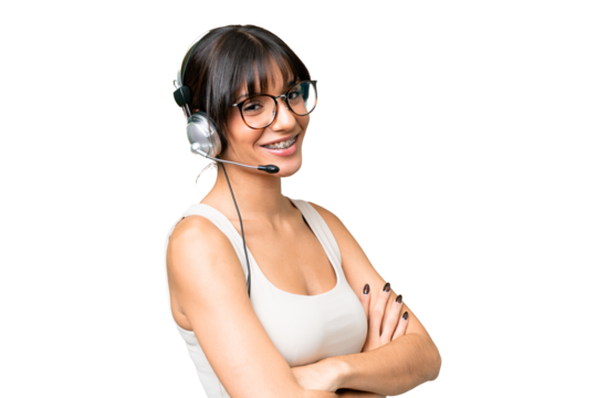 Telemarketer caucasian woman working with a headset over isolated background with arms crossed and looking forward