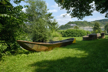 old traditional fishing boat on the bank from the river Main near the town of Zellingen. 