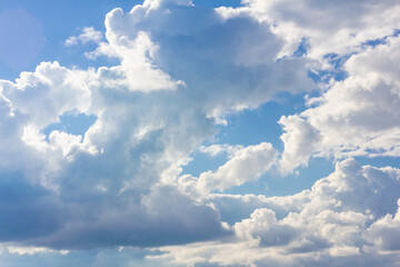 Blue sky background with clouds. Clouds on a clear day