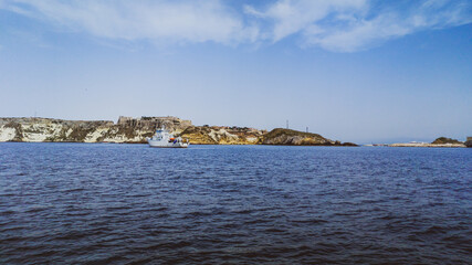 Italy, August 2022, view from the sea of the island of San Nicola in the archipelago of the Tremiti islands