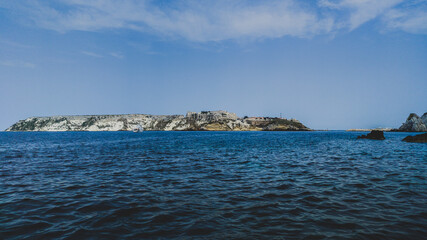 Fototapeta premium Italy, August 2022, view from the sea of the island of San Nicola in the archipelago of the Tremiti islands