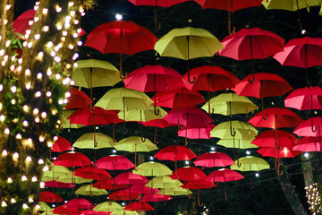 Fototapeta na wymiar Christmas environment full of colorful umbrellas. Holambra