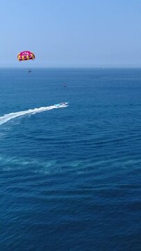 Aerial shot of parasailing in the southern part of Serangan island