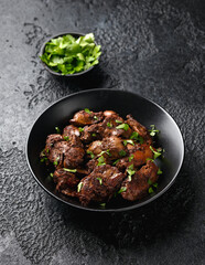 Fried chicken liver, poultry meat food with herbs