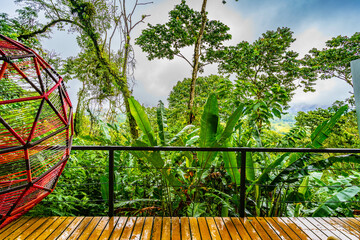 View from the balcony of Sangregado Lodge Hotel room on volcano Arenal and beautiful nature of...