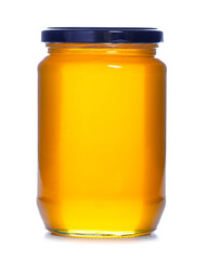 Glass jar of honey on white background isolation