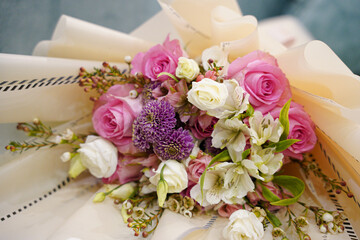 A beautiful bouquet of flowers for woman. Pink,purple and white flowers.                               