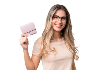 Young Uruguayan woman holding a wallet over isolated background smiling a lot