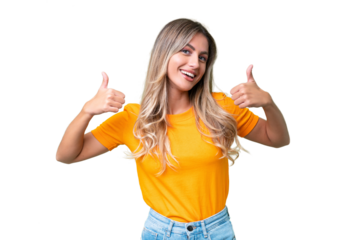 Young Uruguayan woman over isolated background giving a thumbs up gesture