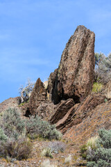 Basalt rock standing vertical in the landscape of Eastern Washington