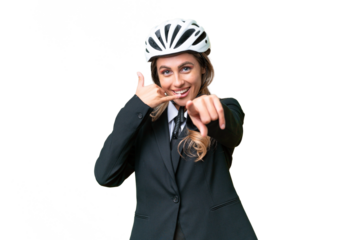 Business Uruguayan woman wearing a helmet biker over isolated background making phone gesture and pointing front