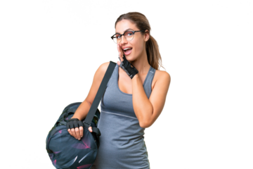 Pretty Young Uruguayan sport woman with sport bag over isolated background whispering something