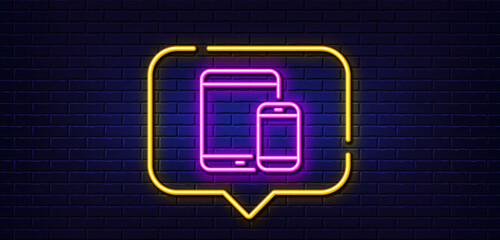 Neon light speech bubble. Mobile Devices icon. Smartphone and Tablet PC signs. Touchscreen gadget symbols. Neon light background. Mobile devices glow line. Brick wall banner. Vector