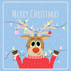 Christmas deer with garlands in a red sweater