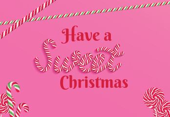 Have a sweet Christmas banner concept. Vector candy cane text and sweets. Brushes used for design are included in swatches.   - 553033247