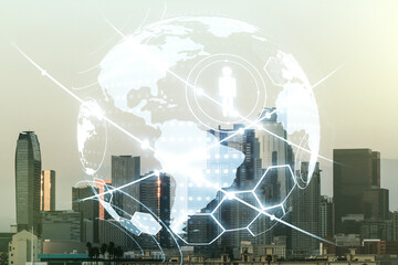 Virtual social network media hologram and world map on Los Angeles cityscape background. Double exposure