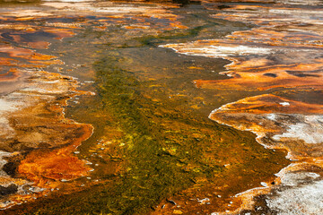 colorful stones around geysers at Yellowstone National Park 